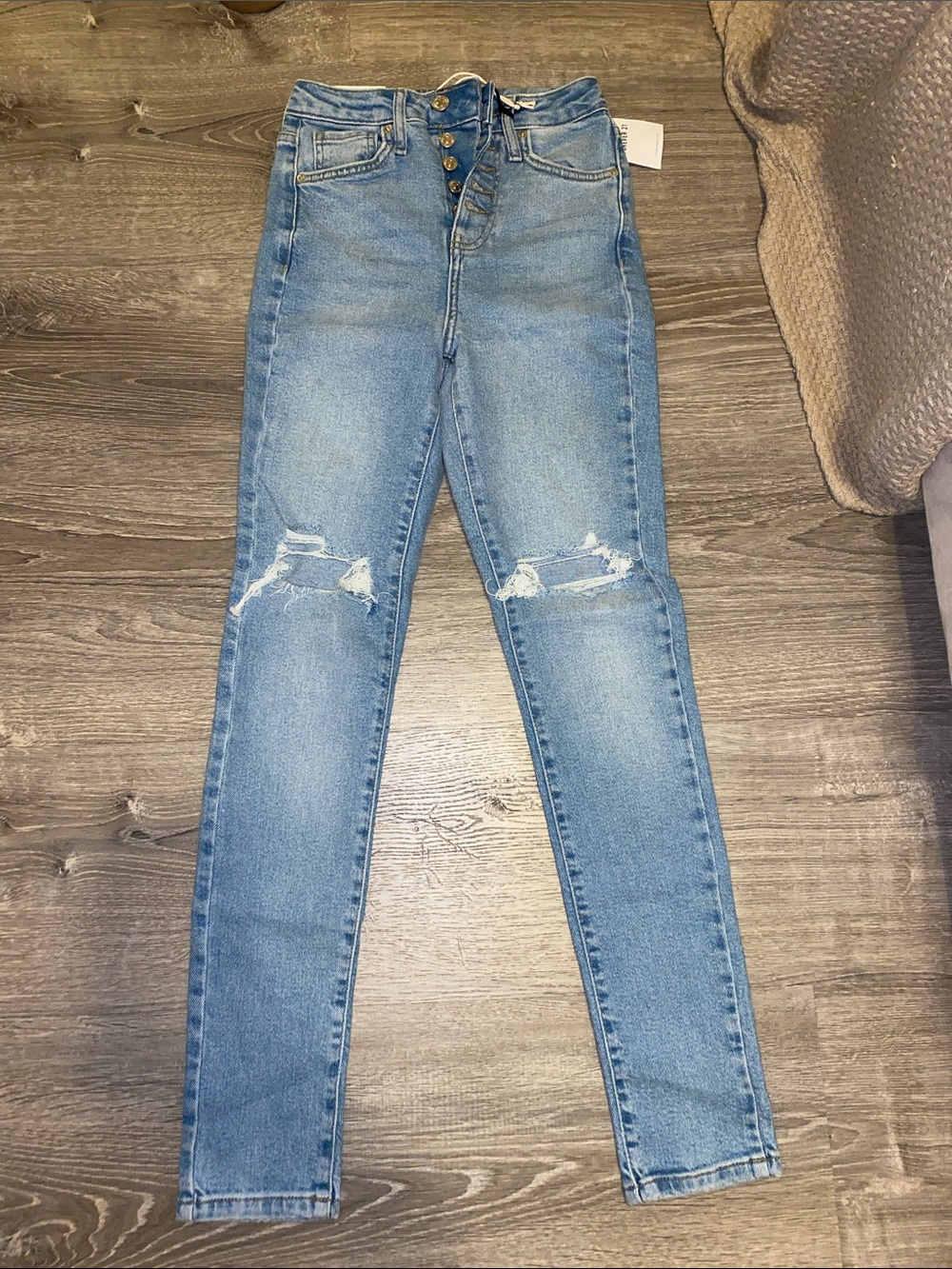 Forever 21 Light Blue Skinny Jeans with Knee Rips